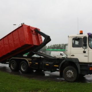 вывоз мусора бункером